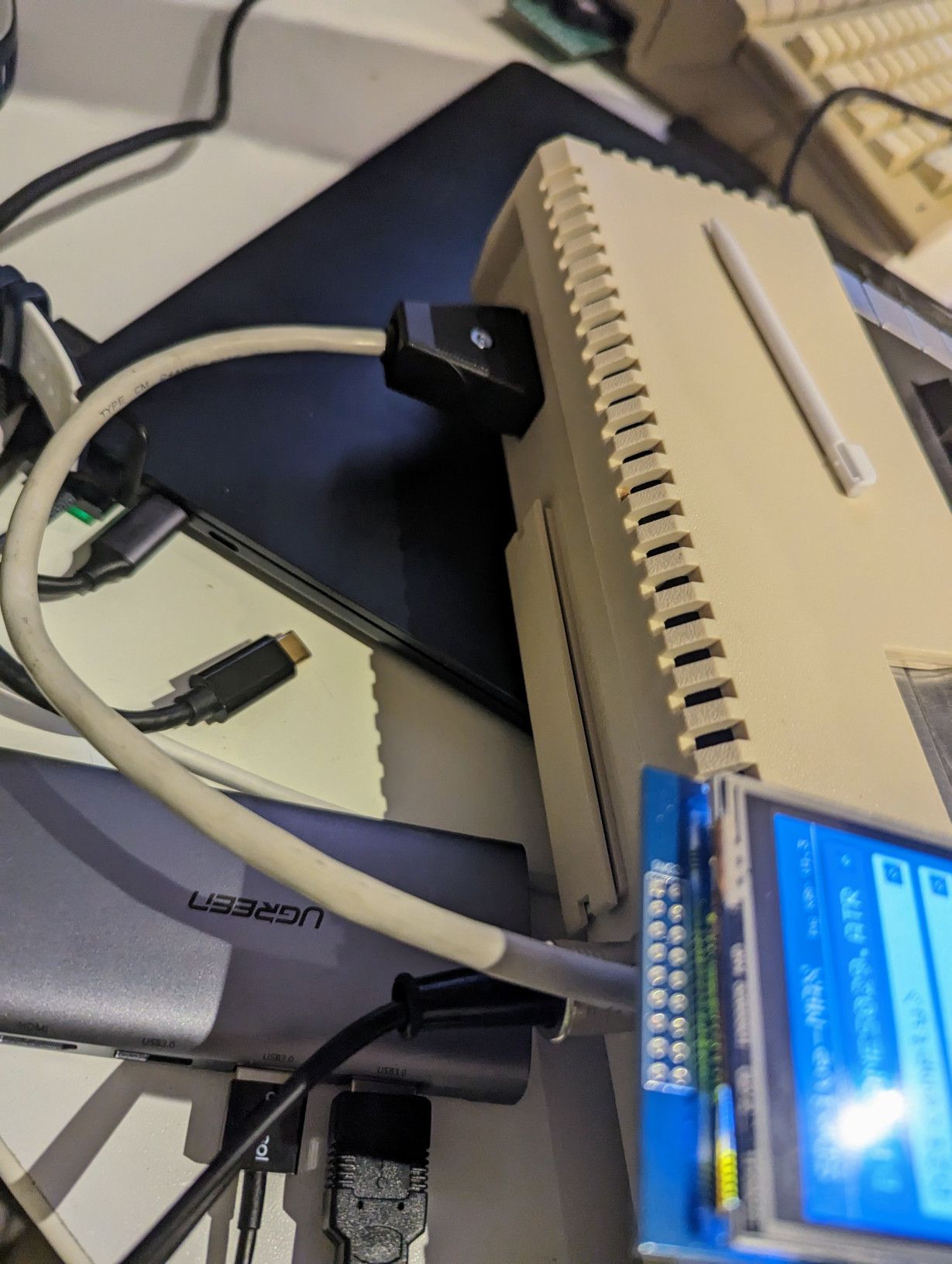 The SDrive-Max and it's SIO plug in the back of an 800XL